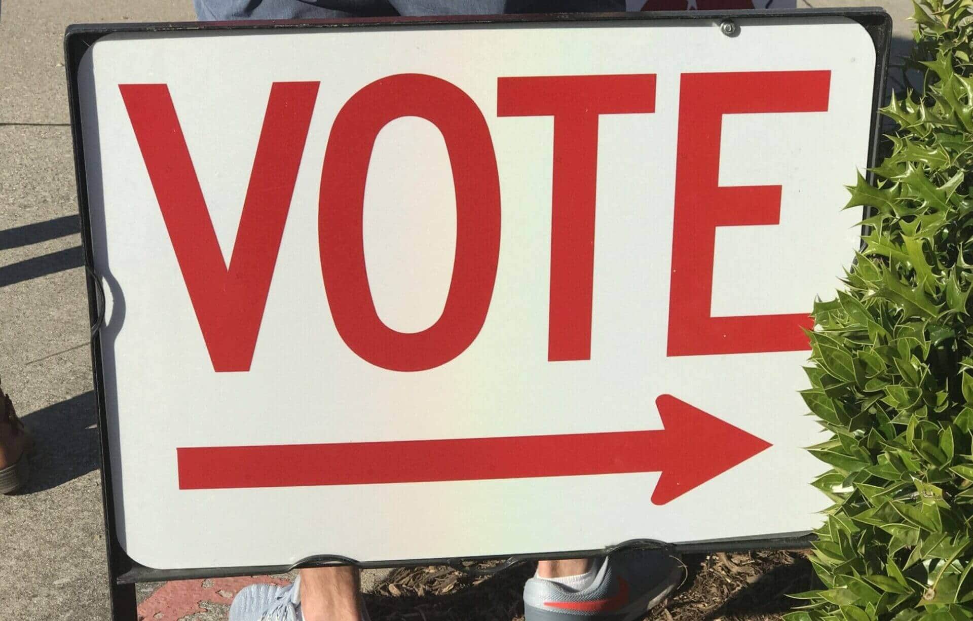 A VOTE sign at a polling place.