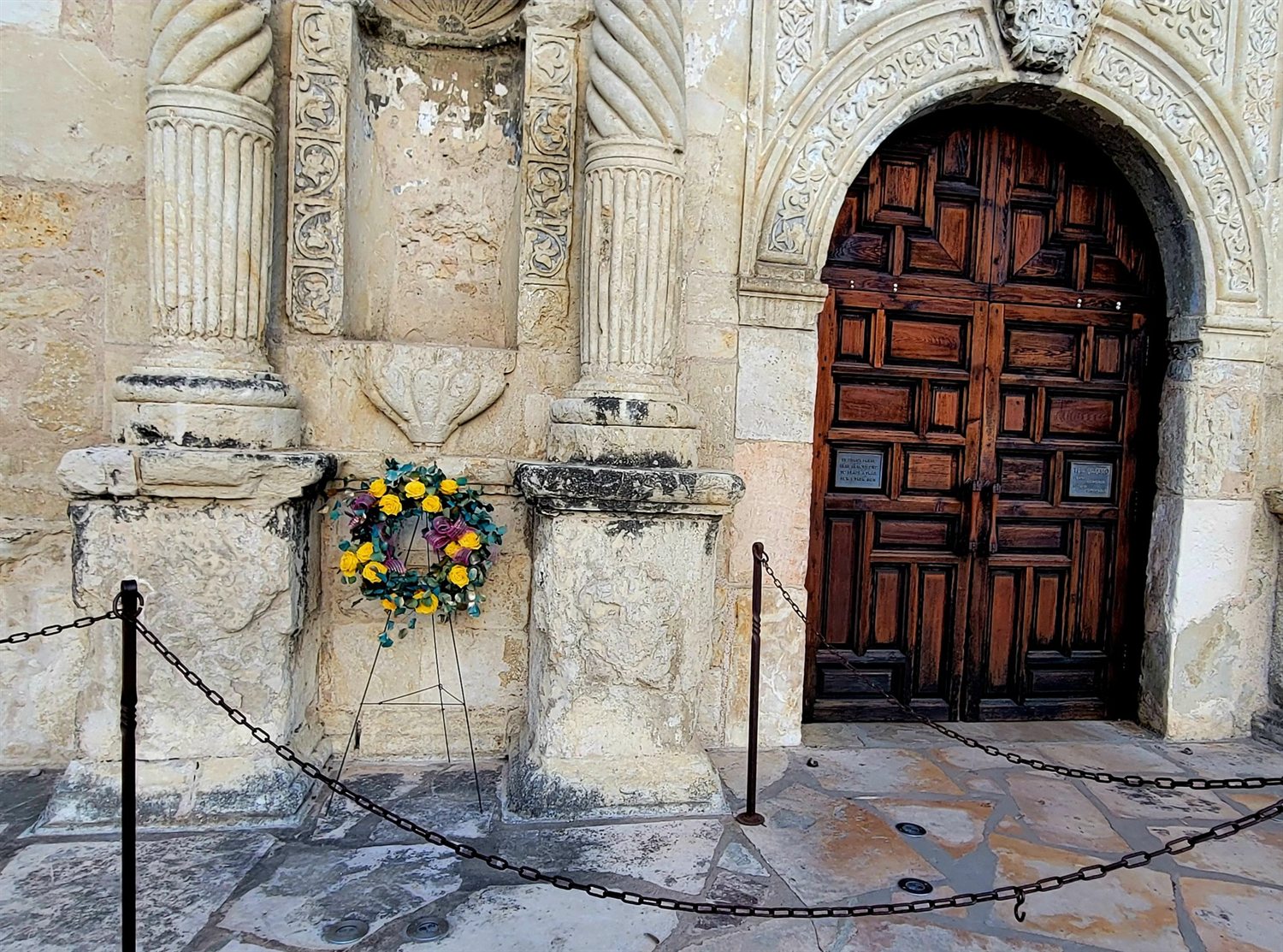 A wreath at the foot of the Alamo in San Antonio.